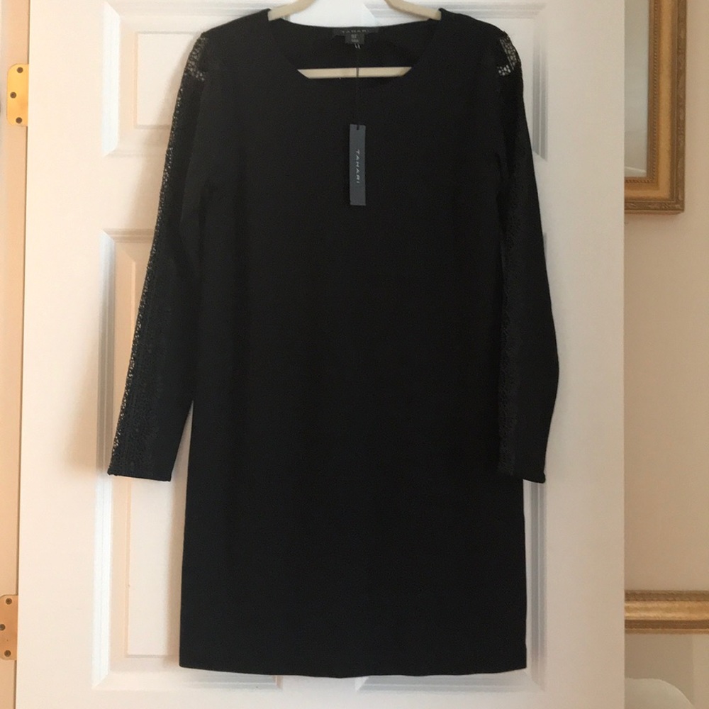 dress by Tahari black with lace on arms.